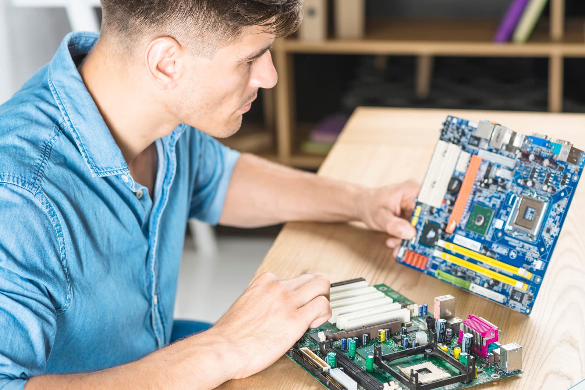 Engineer working on motherboard
