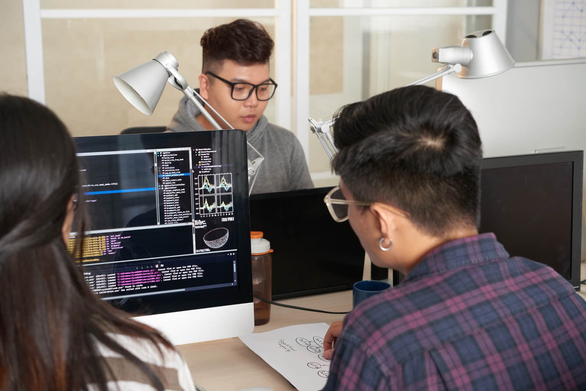 Team of programmers collaborating